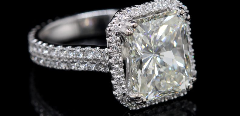 Emerald halo engagement ring